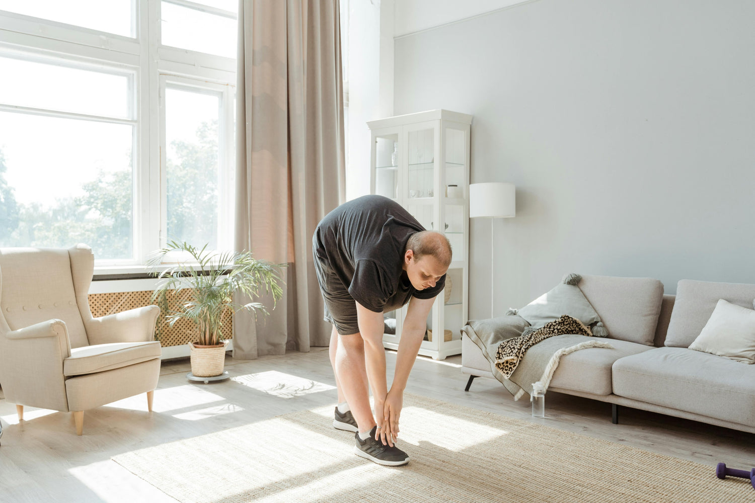 Photo by MART  PRODUCTION: https://www.pexels.com/photo/man-exercising-at-home-8846442/