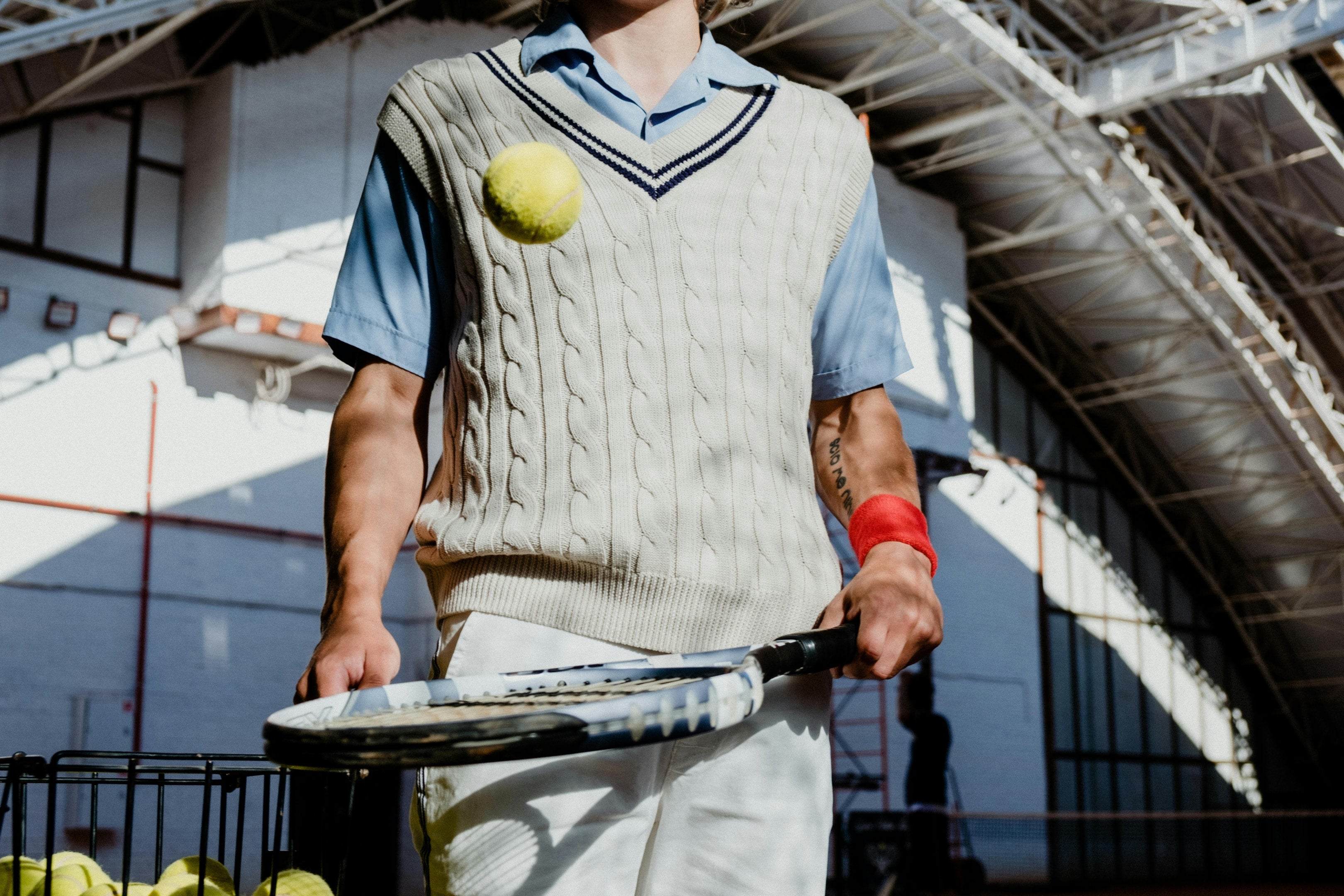 Photo by cottonbro studio: https://www.pexels.com/photo/tennis-player-bouncing-the-ball-on-a-racket-5739161/