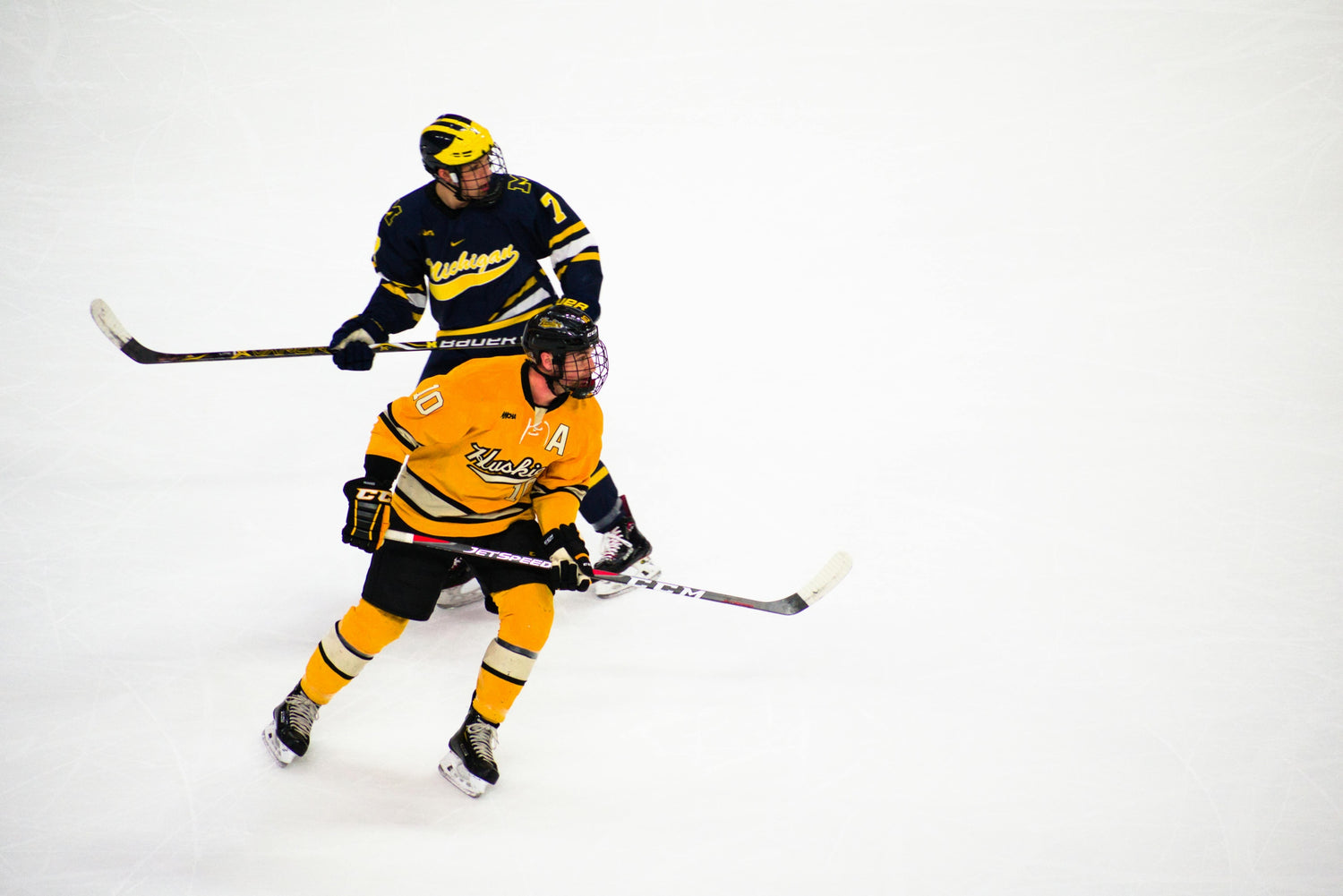 Photo by Lynda Sanchez: https://www.pexels.com/photo/hockey-players-playing-inside-a-rink-1770650/