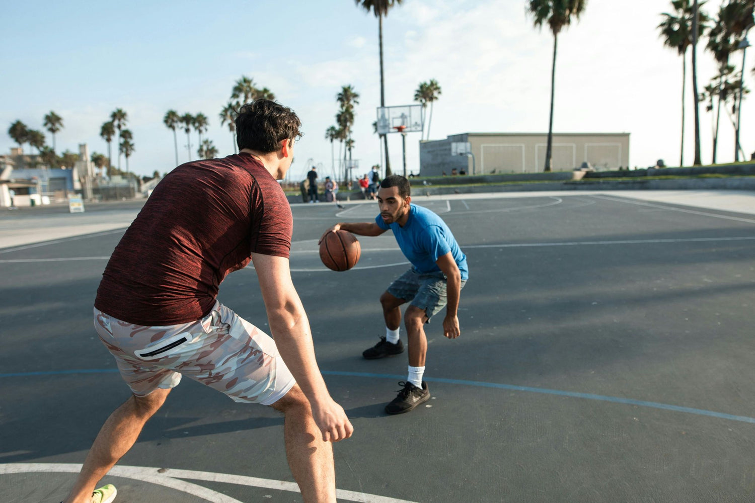 Photo by RDNE Stock project: https://www.pexels.com/photo/dedicated-diverse-friends-playing-basketball-on-sports-ground-5837019/