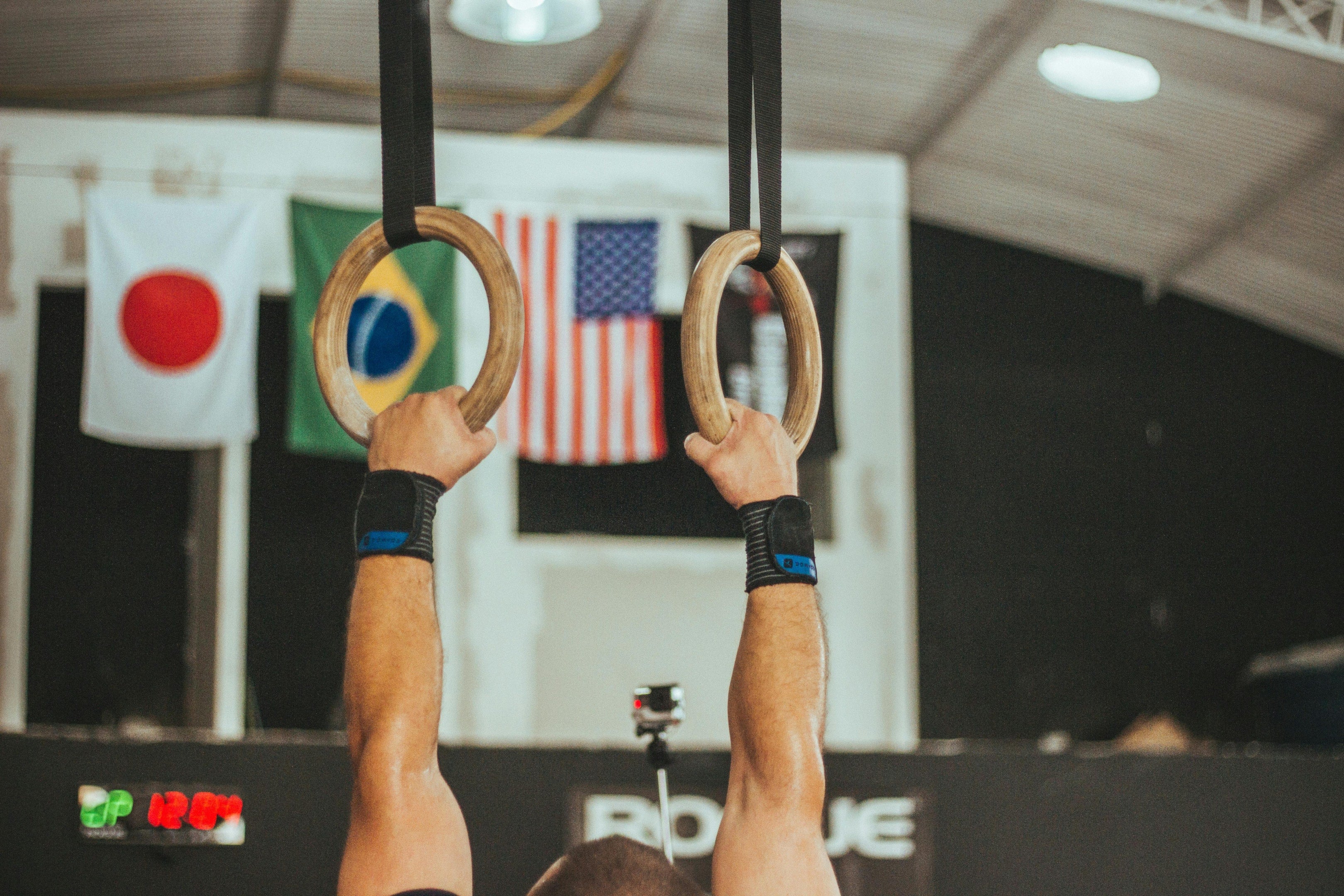 Photo by Victor Freitas: https://www.pexels.com/photo/gymnast-near-assorted-country-flags-931325/