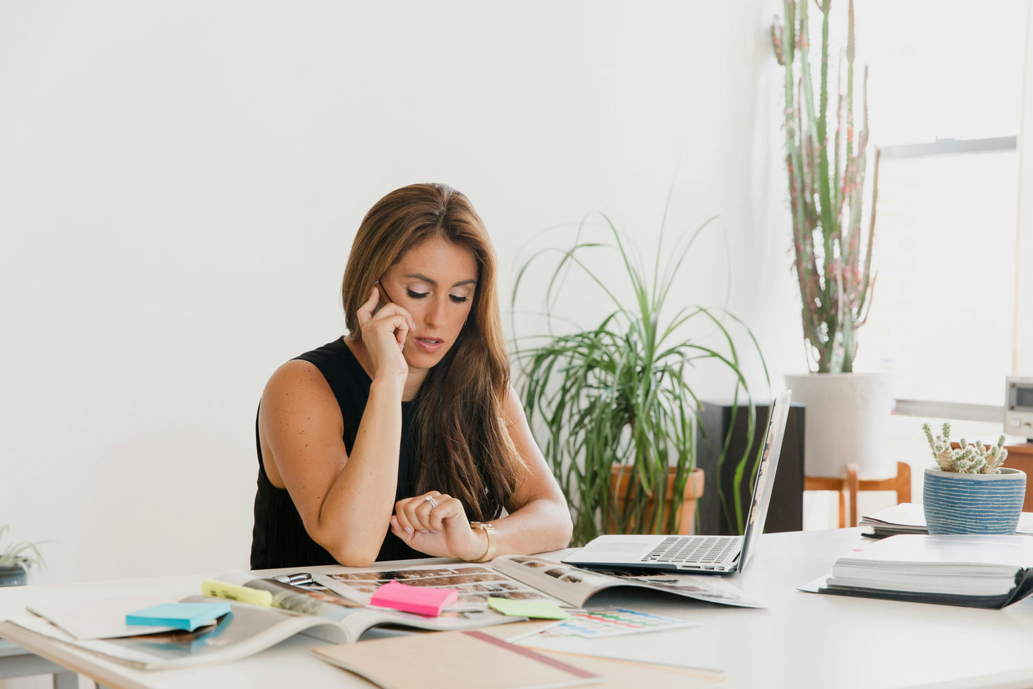 Photo by RDNE Stock project: https://www.pexels.com/photo/a-woman-looking-at-the-time-while-talking-on-the-phone-8279007/