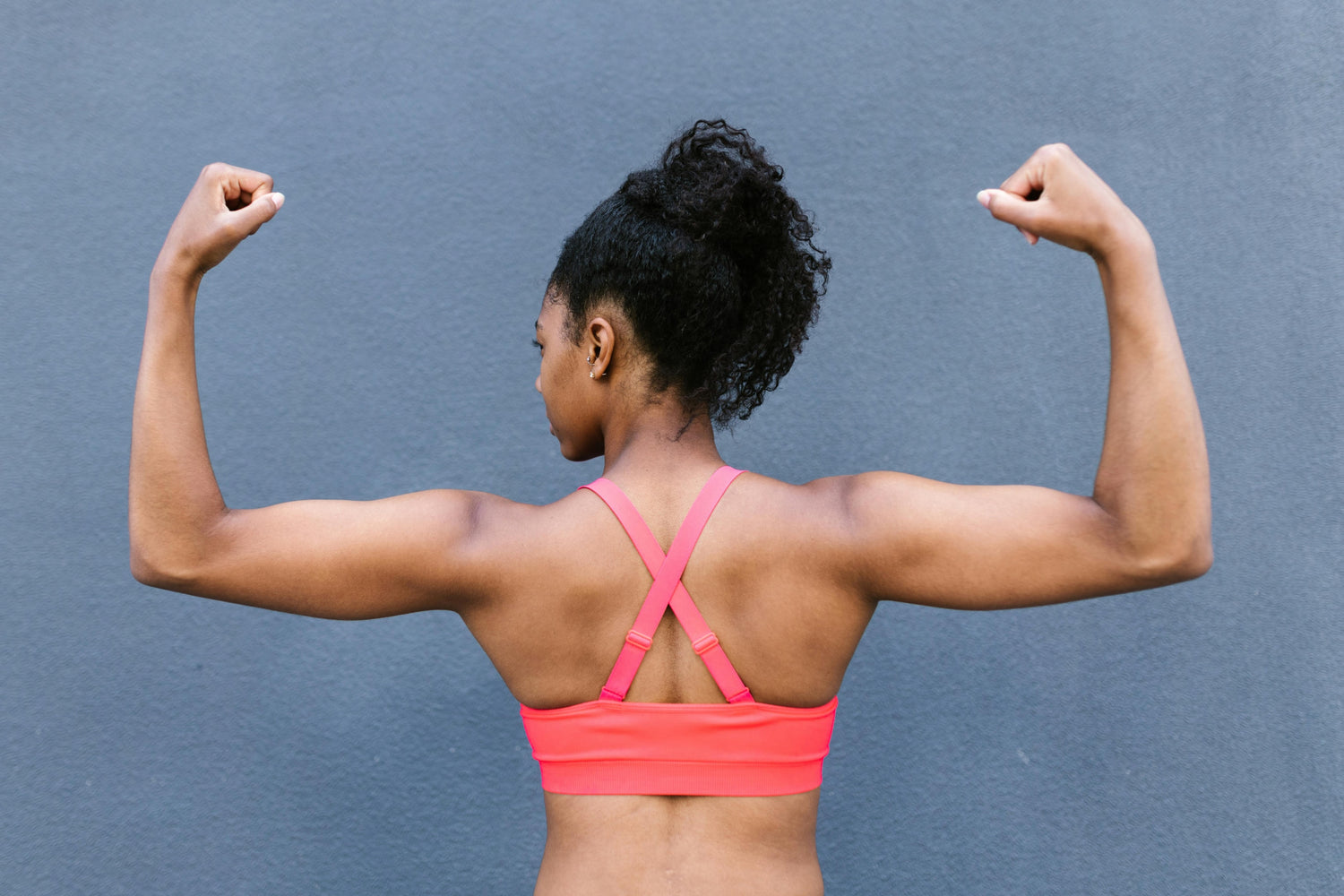 Photo by RDNE Stock project: https://www.pexels.com/photo/a-woman-in-pink-top-flexing-8401904/