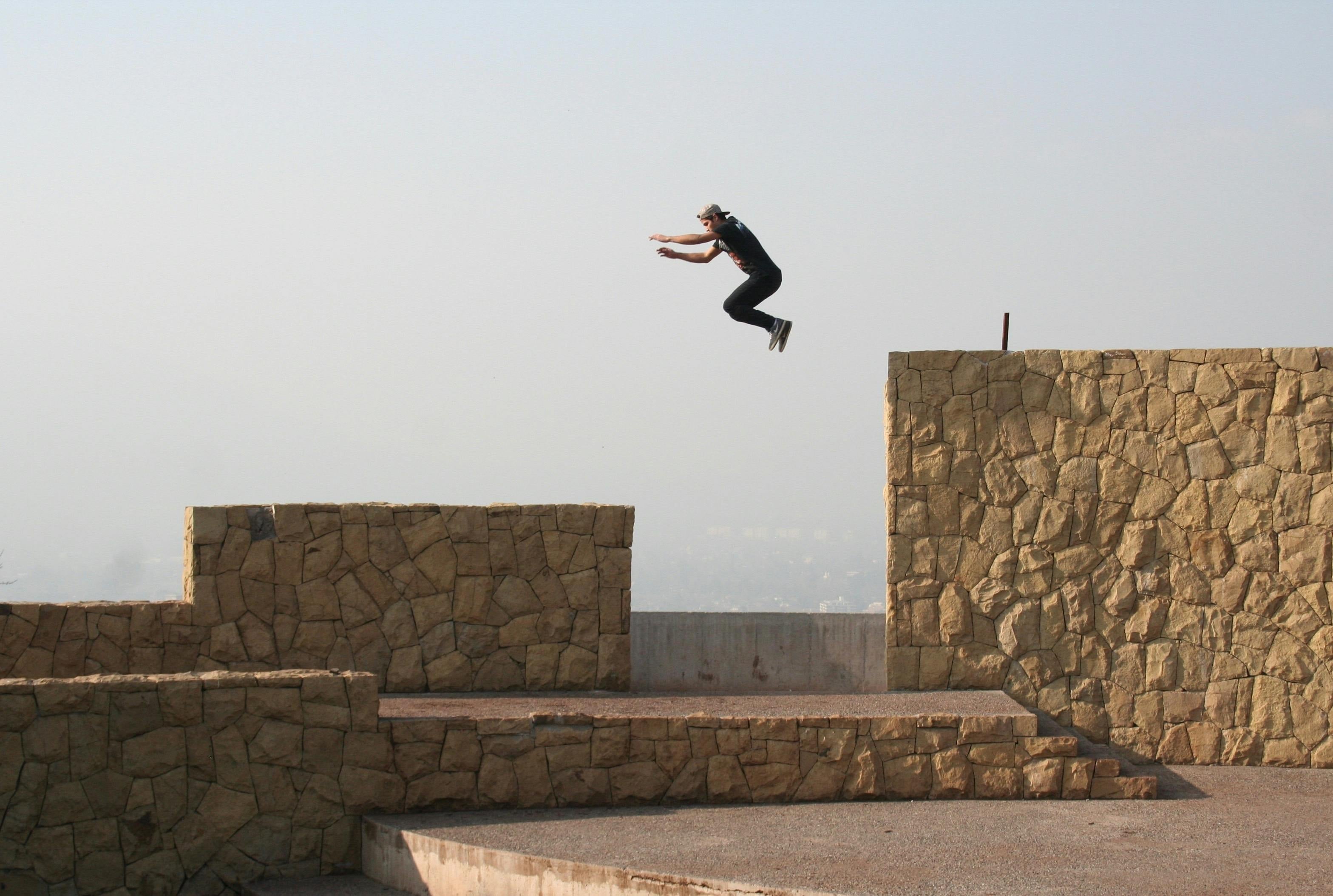 Photo by Histuan Horvath: https://www.pexels.com/photo/person-jumping-on-beige-concrete-wall-2244829/