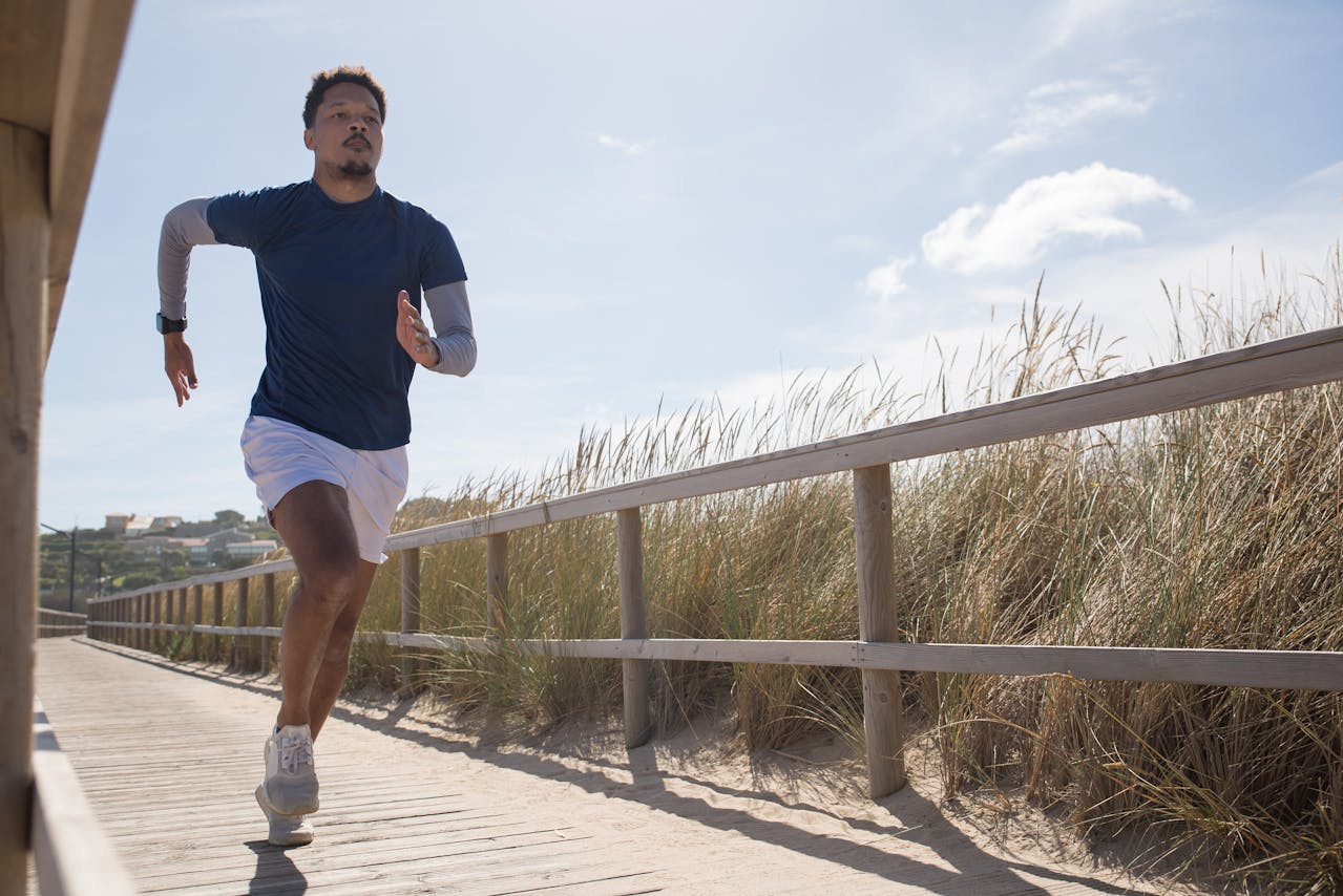 Photo by Kampus Production: https://www.pexels.com/photo/photo-of-a-man-in-a-blue-shirt-running-8381760/