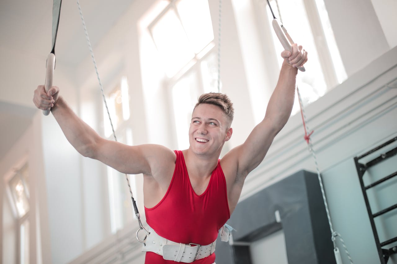 Photo by Andrea Piacquadio: https://www.pexels.com/photo/strong-man-in-harness-holding-gymnastic-rings-3763706/