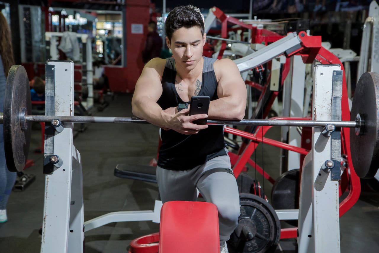 Photo by Sabel Blanco: https://www.pexels.com/photo/man-resting-his-hands-on-hanged-barbell-1480530/