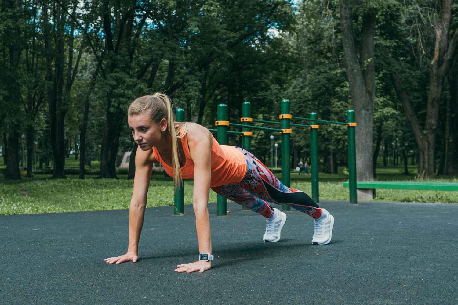 Photo by Antoni Shkraba: https://www.pexels.com/photo/a-woman-exercising-in-the-park-playground-5149165/