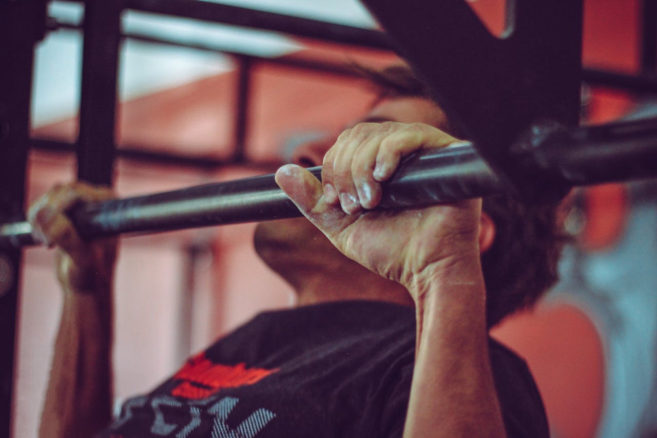 Photo by Victor Freitas: https://www.pexels.com/photo/man-in-black-crew-neck-shirt-doing-pull-ups-791764/